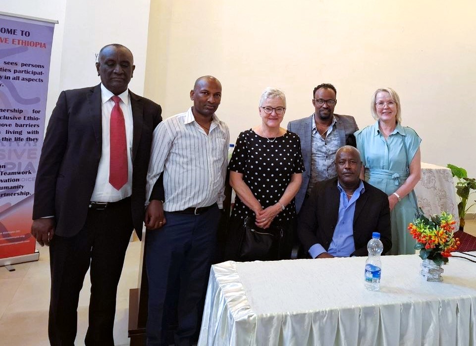 Participants pose at a project-launch workshop.